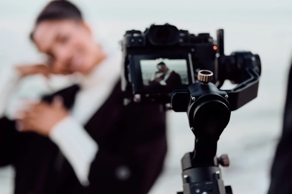Cinema camera on a gimbal filming a couple