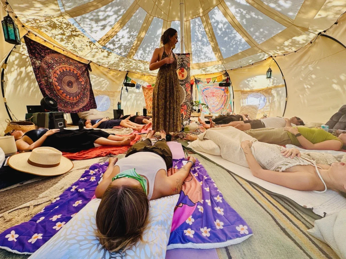 A gathering inside the ceremony tent