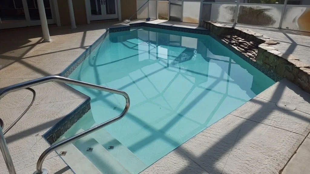 Clear pool steps and hand rail