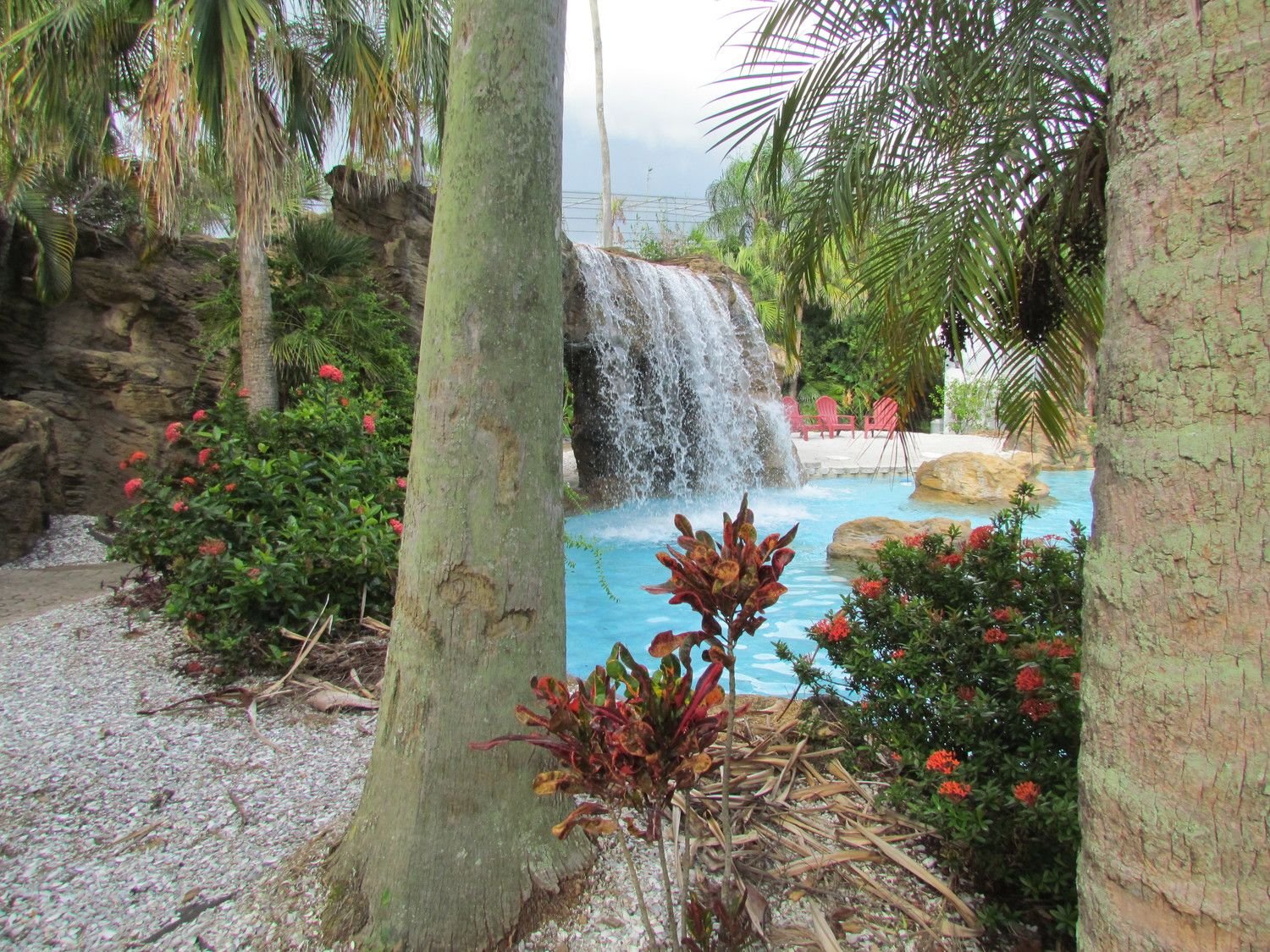 Garden waterfall feeding a pool