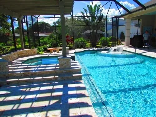 Sunny screened pool enclosure