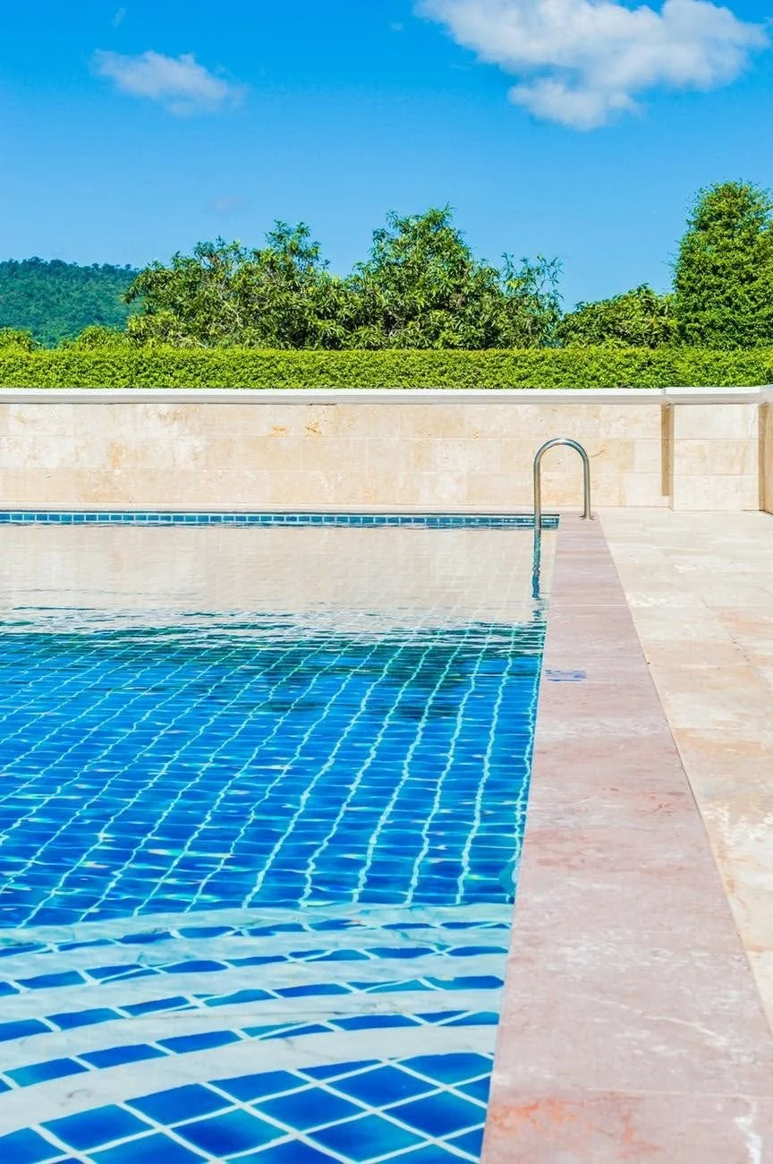 Clear pool water along the tile edge