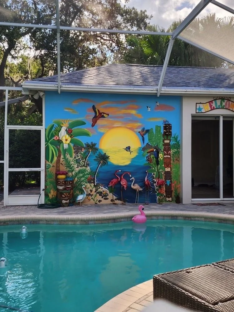 Screened customer pool with a tropical mural