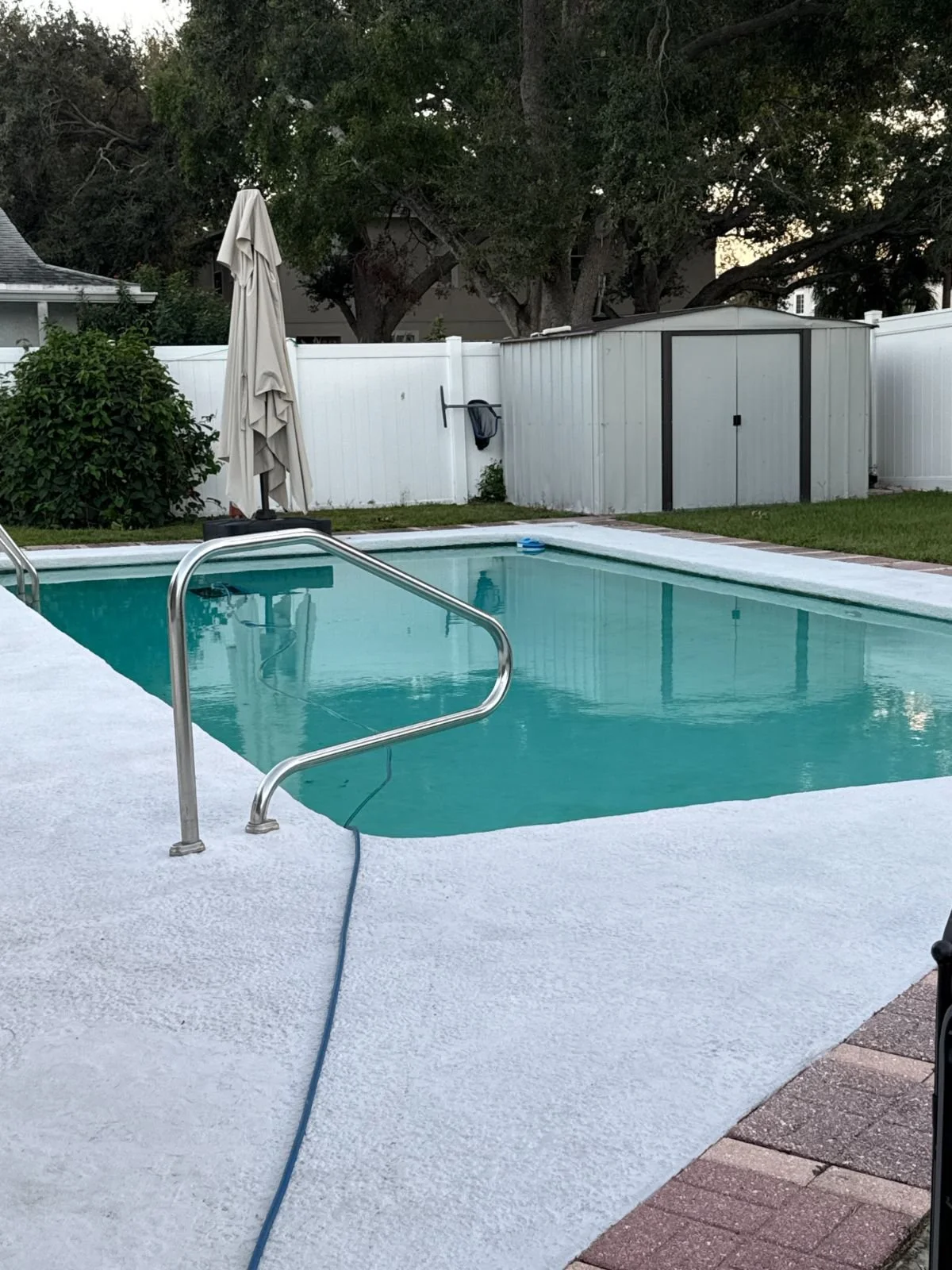 Fenced backyard pool