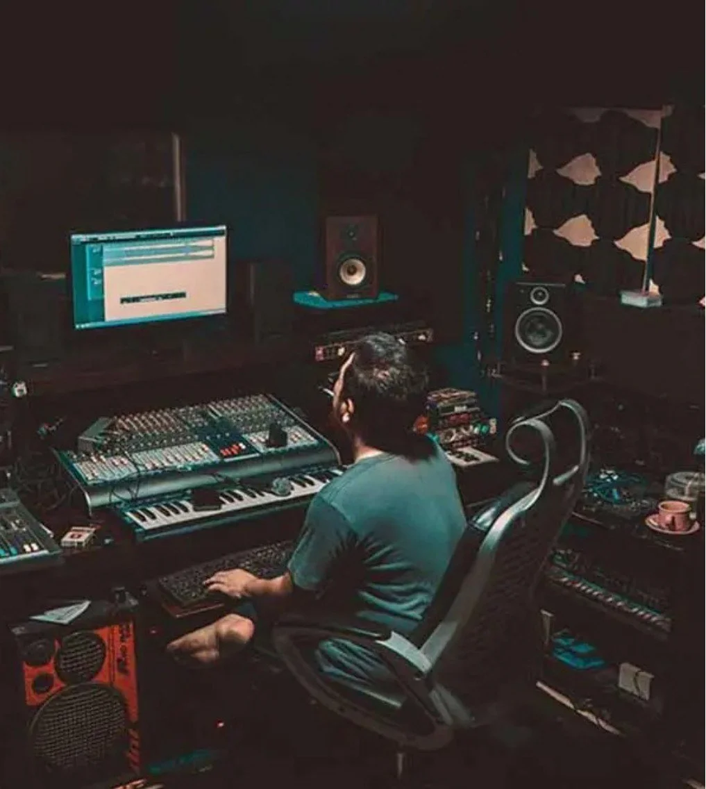 Create a musical device that combines digital and physical interaction elements.