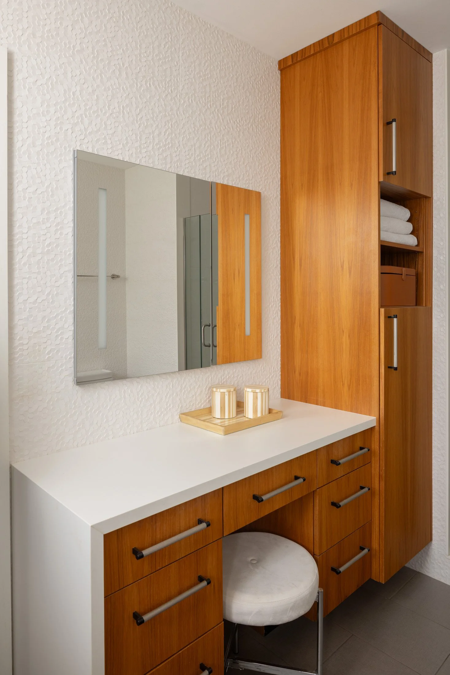 Wood bathroom storage cabinet and dressing counter with an upholstered stool