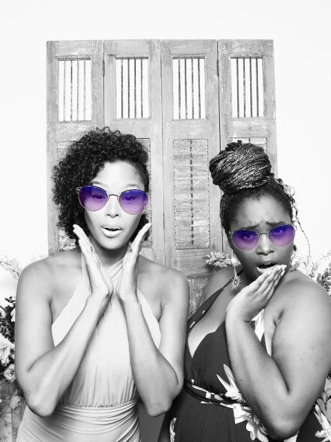 Supplier black-and-white duo with playful purple-glasses face effects
