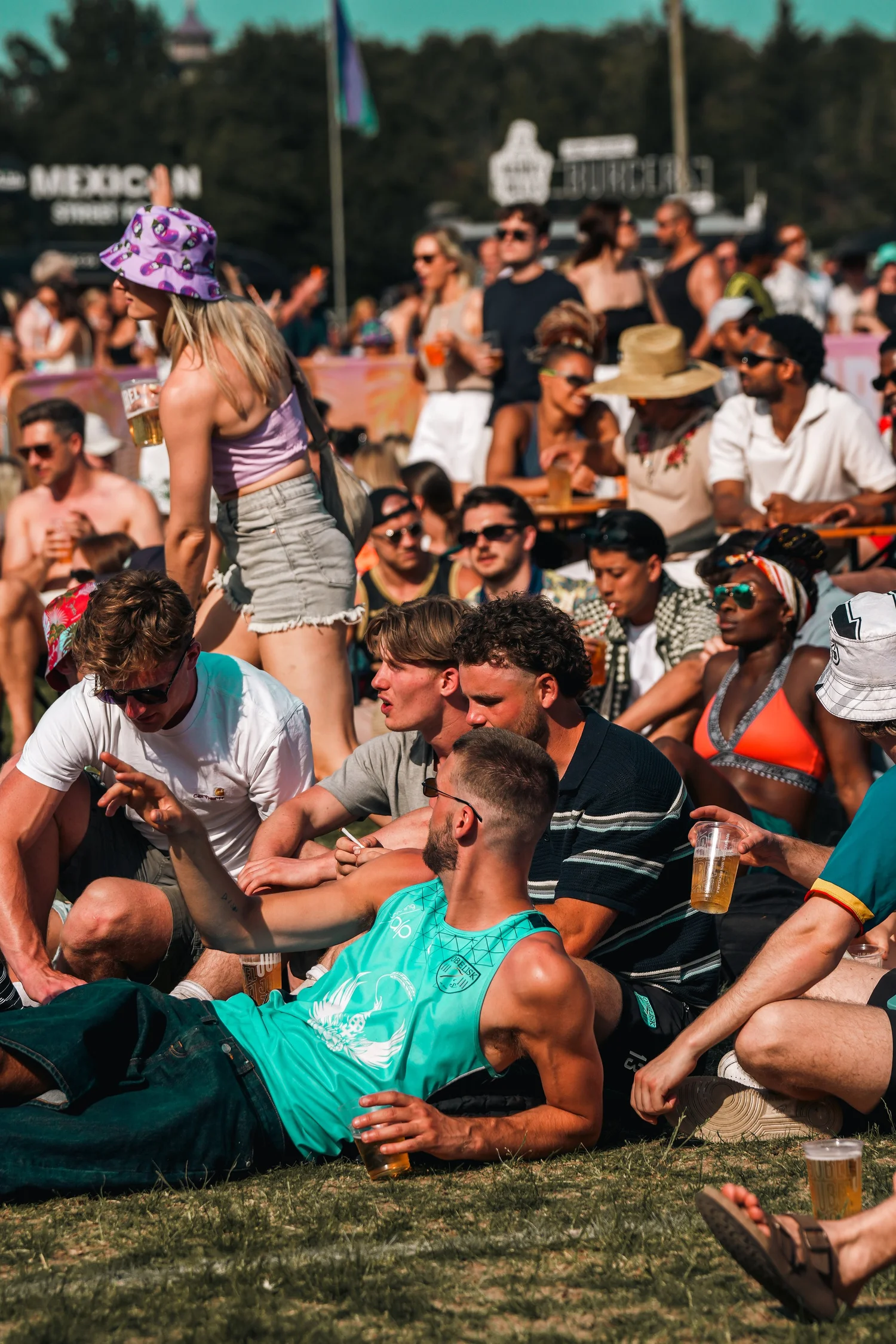 Festival-goers relaxing together at Summer Social