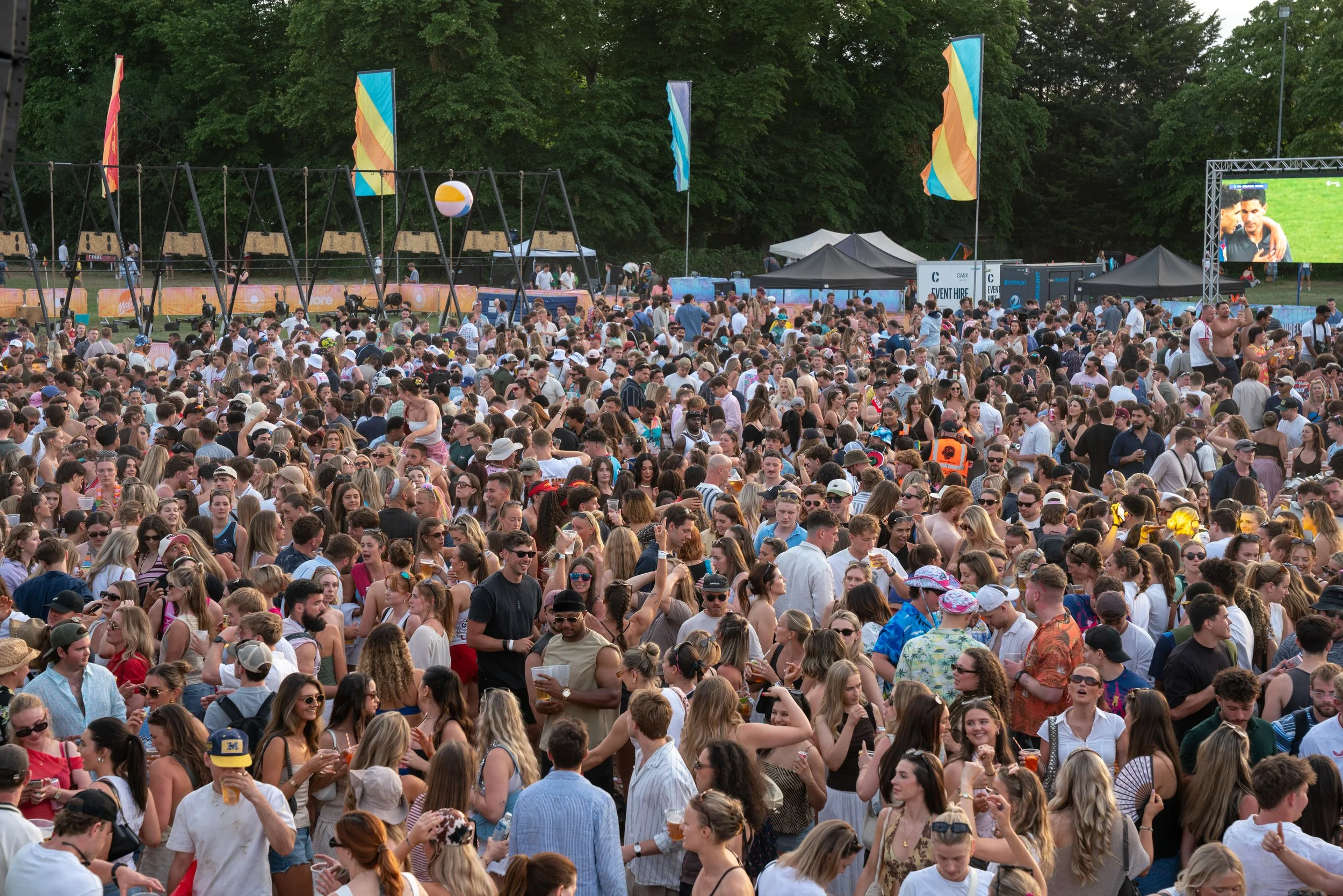A packed Summer Social festival crowd across the field