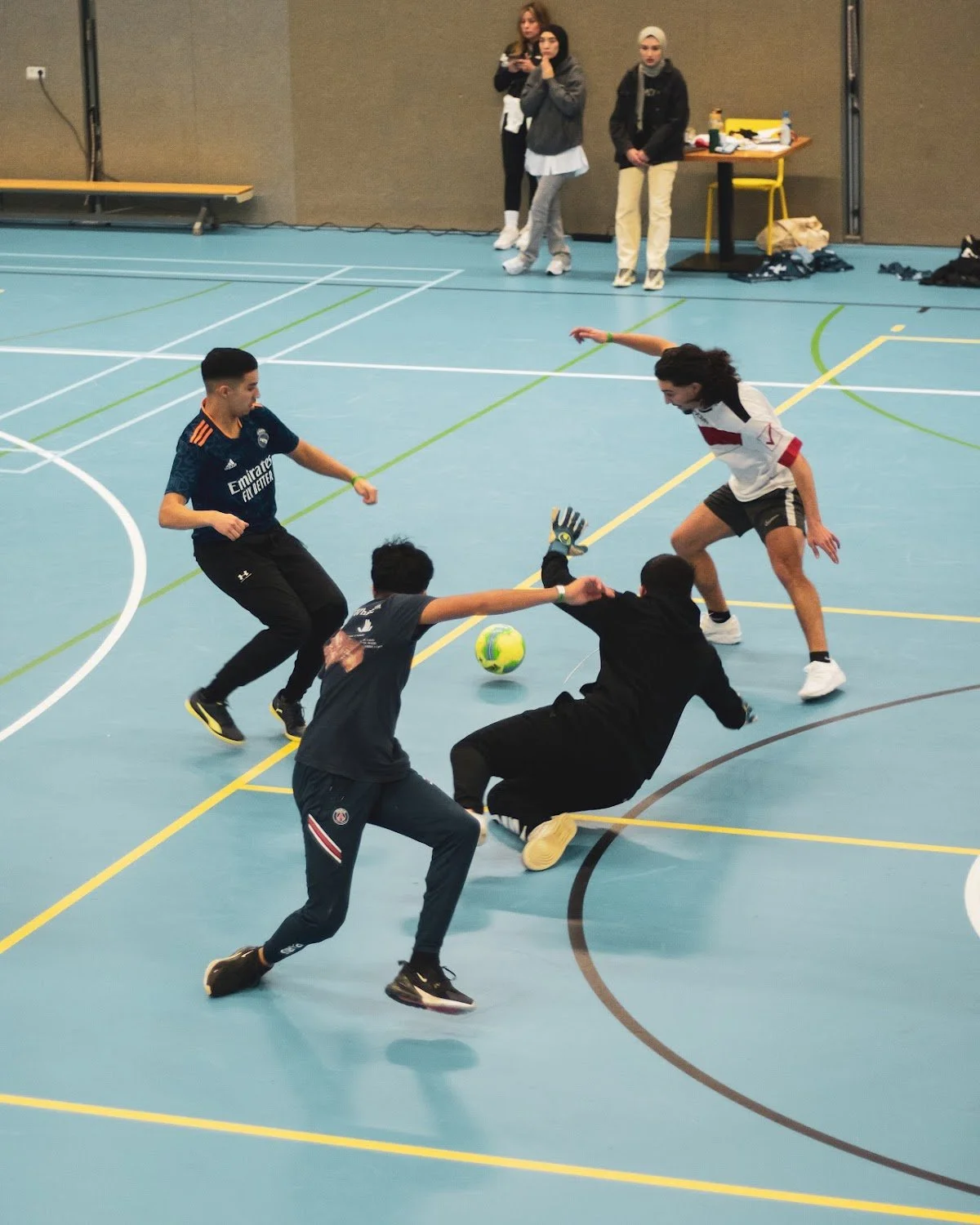 Teenagers playing in a Make A Kid Happy football tournament