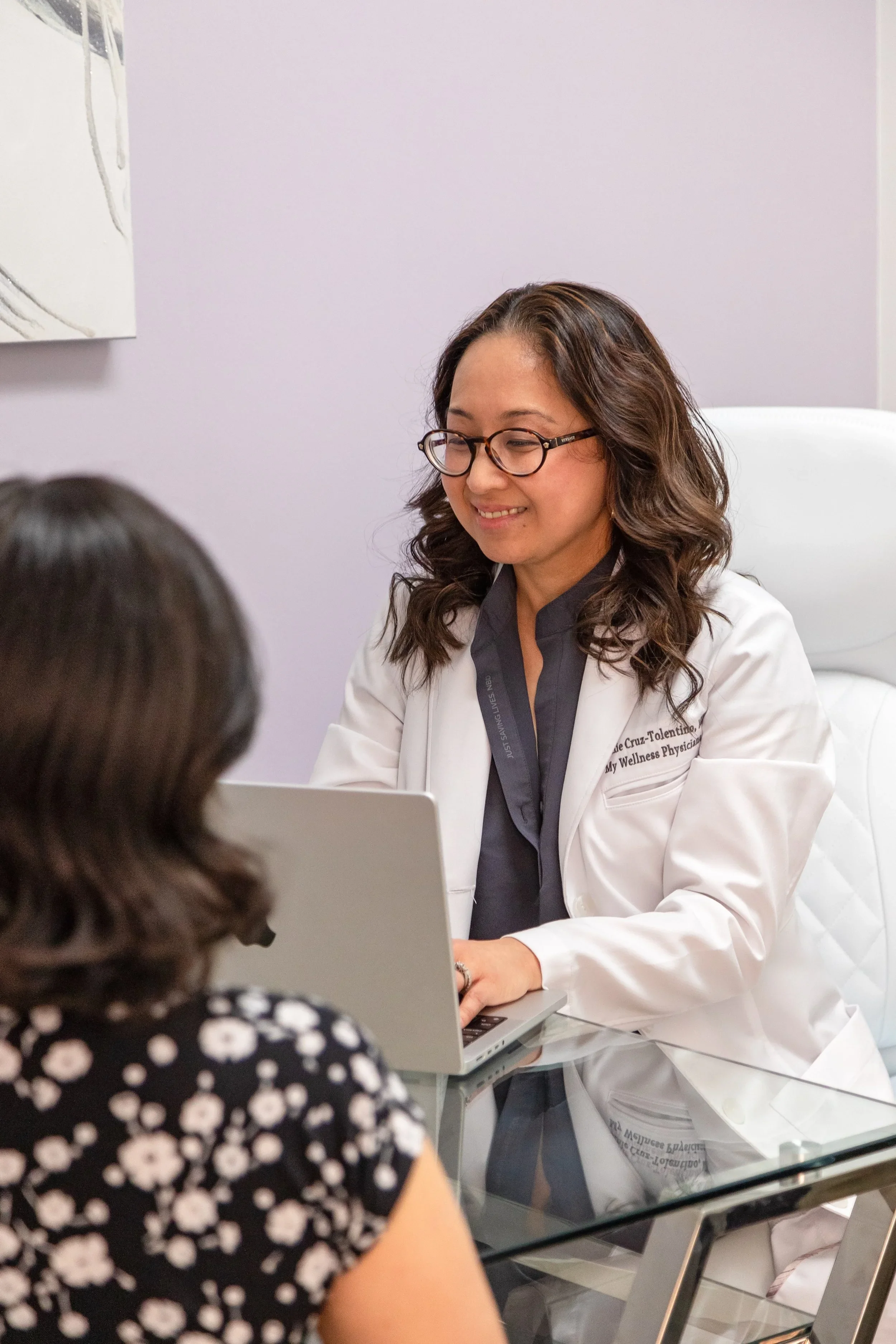 Dr. Cruz-Tolentino with a patient at My Wellness Physicians