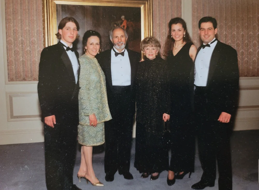 The Dalba family dressed for a formal event