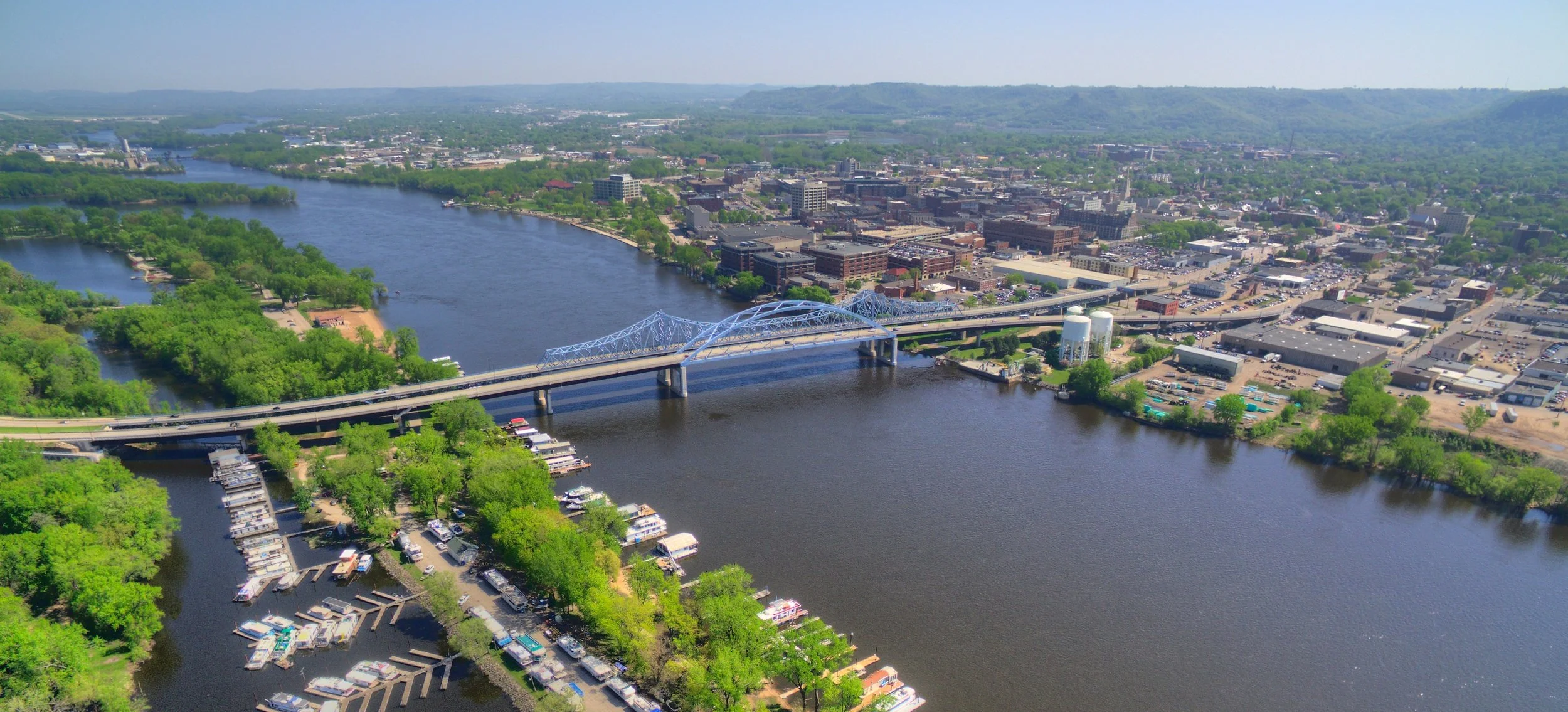 Aerial view of La Crosse, the Mississippi River, downtown, and surrounding bluffs
