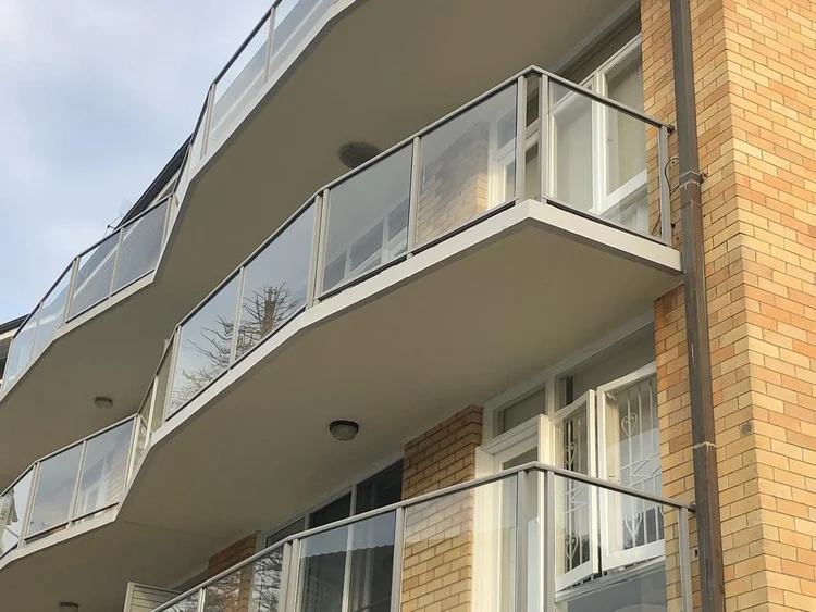 Restored balconies on a Bondi strata building by PQC Painting Solutions