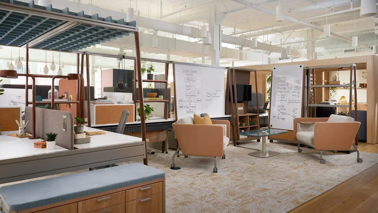 Open studio with mobile storage, whiteboards and lounge chairs
