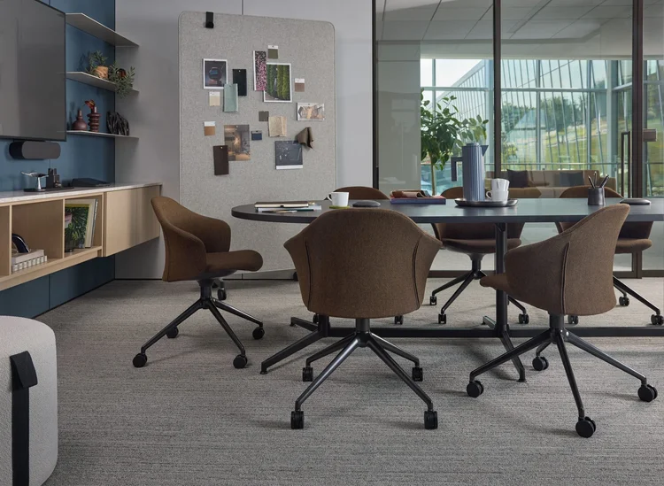 Meeting table with brown swivel chairs