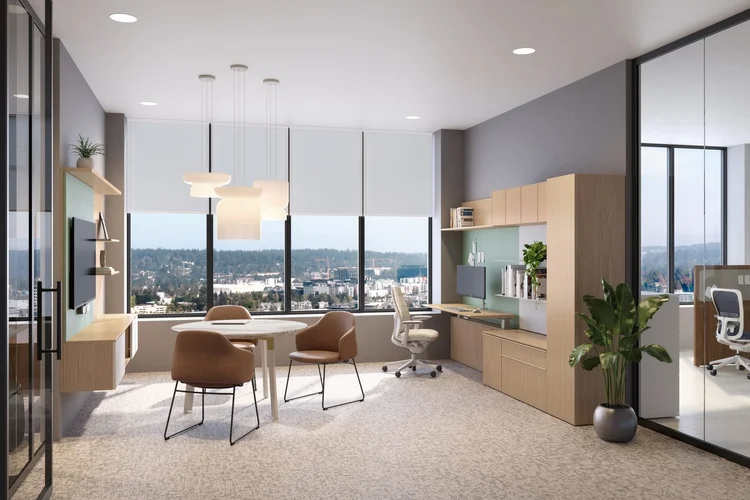 Corner office with storage wall and round meeting table
