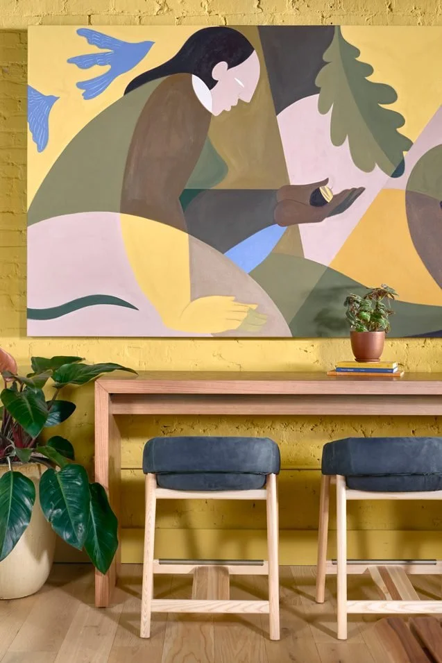 Wood console table with upholstered stools