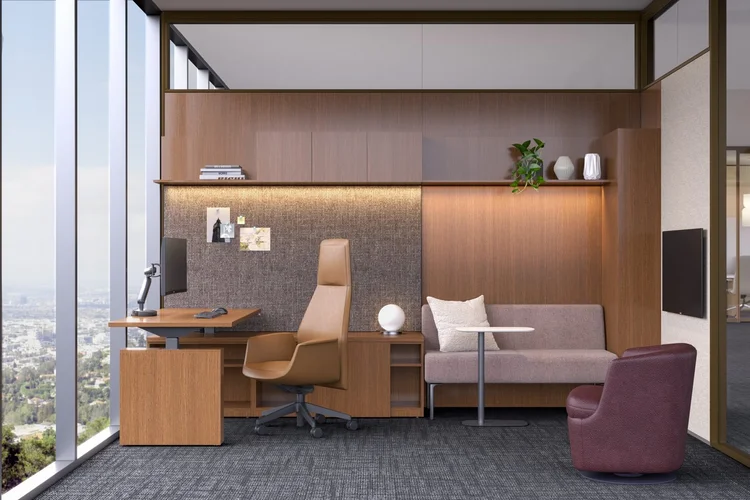 Executive office with wood wall paneling, sofa and swivel chair