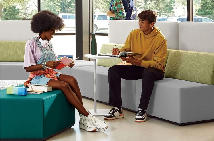 Students on modular lounge seating and an ottoman