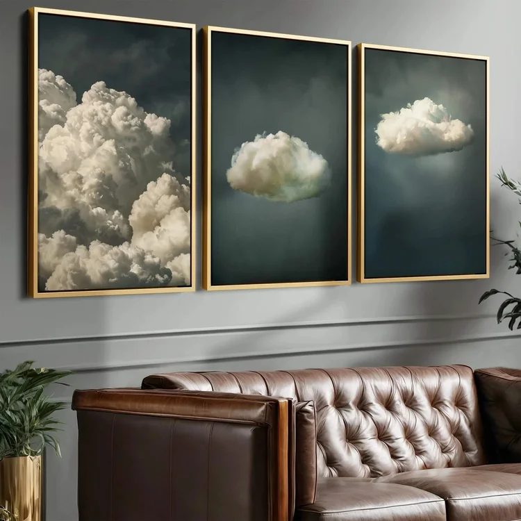 Cloud triptych artwork above a leather sofa