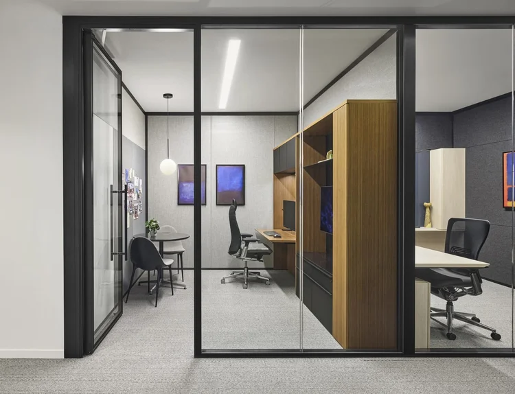 Architectural glass walls and modular workspace
