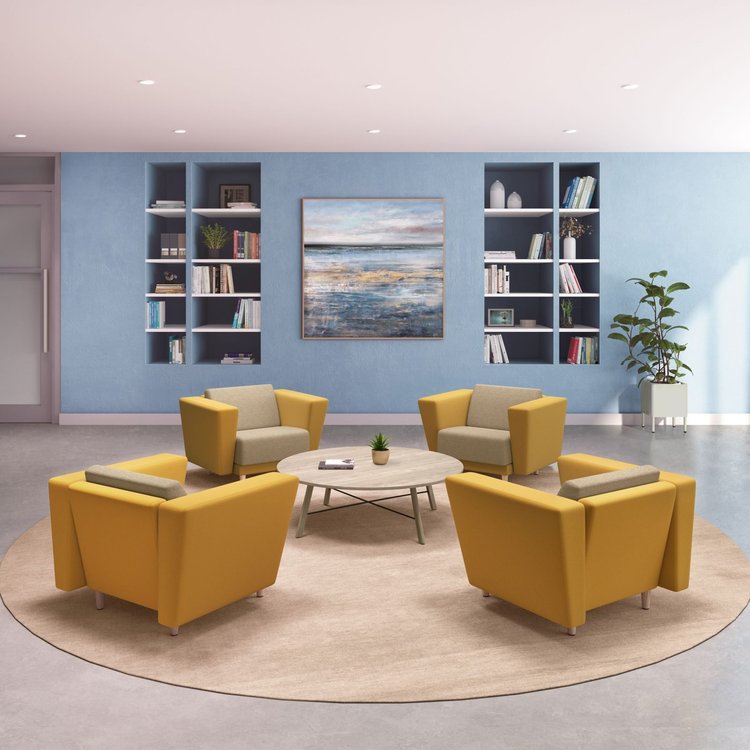 Four yellow lounge chairs around a round coffee table