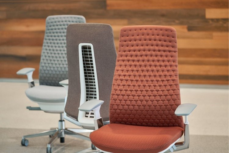 High-back task chairs in grey, taupe and orange