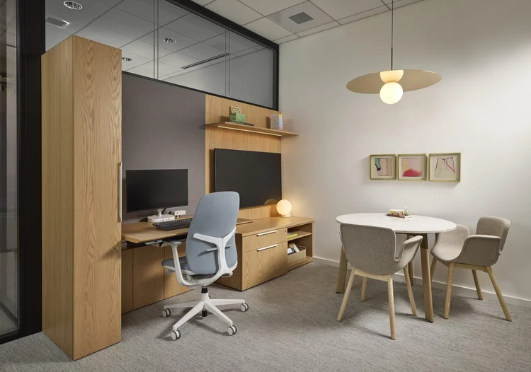 Private office with oak wardrobe, desk and small meeting table