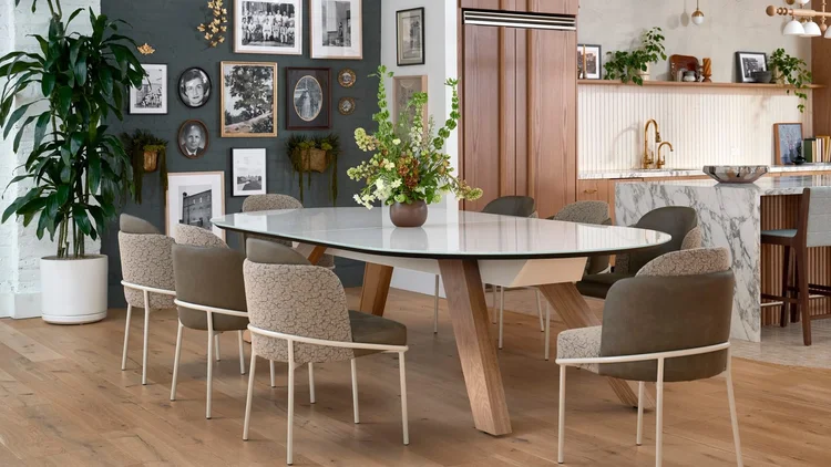 Oval dining table with upholstered chairs