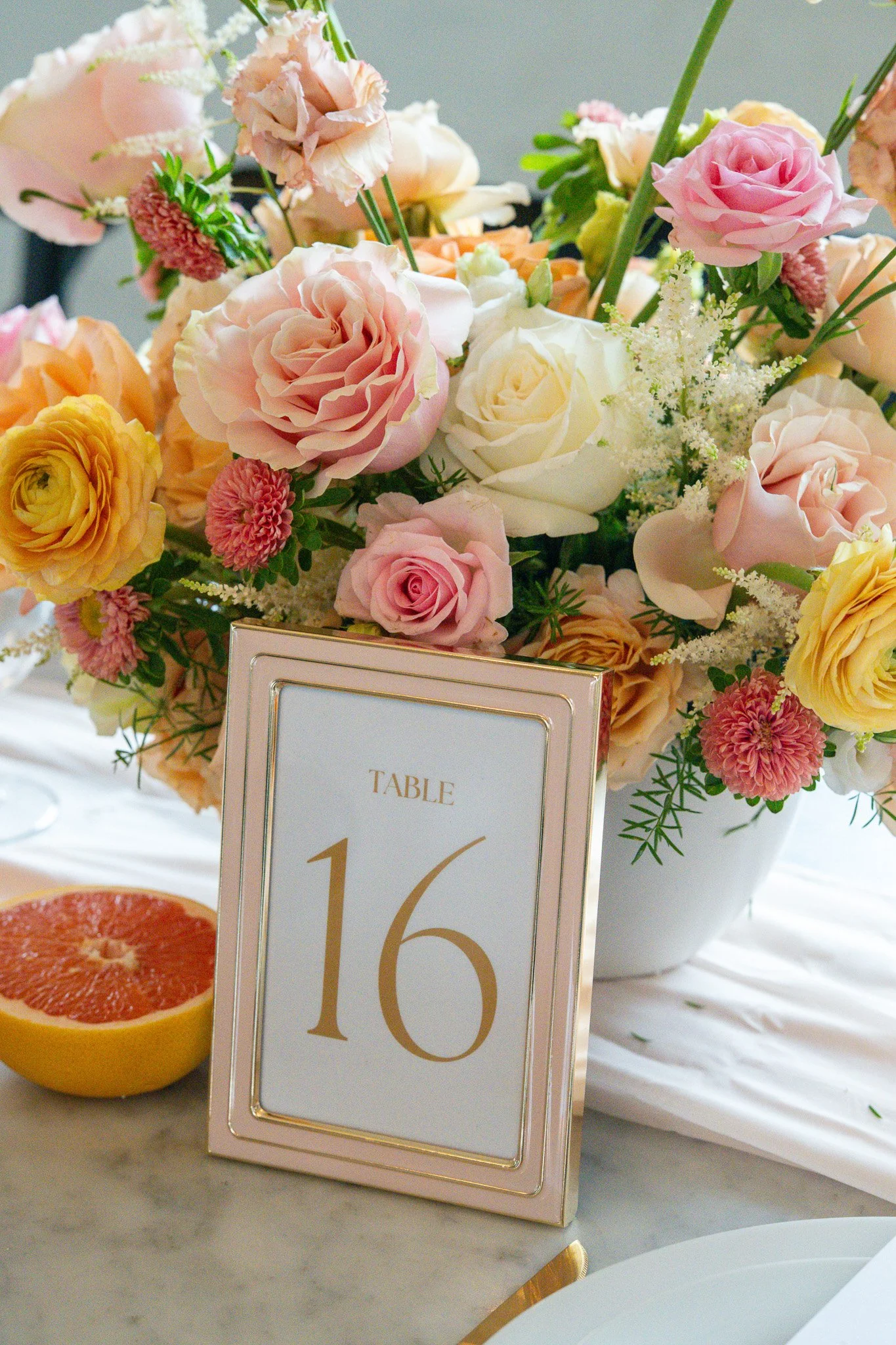 Peach and pink florals with table number 16
