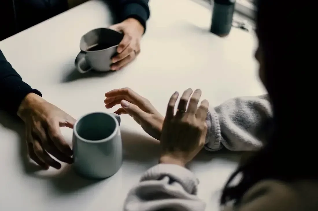 Two people in conversation