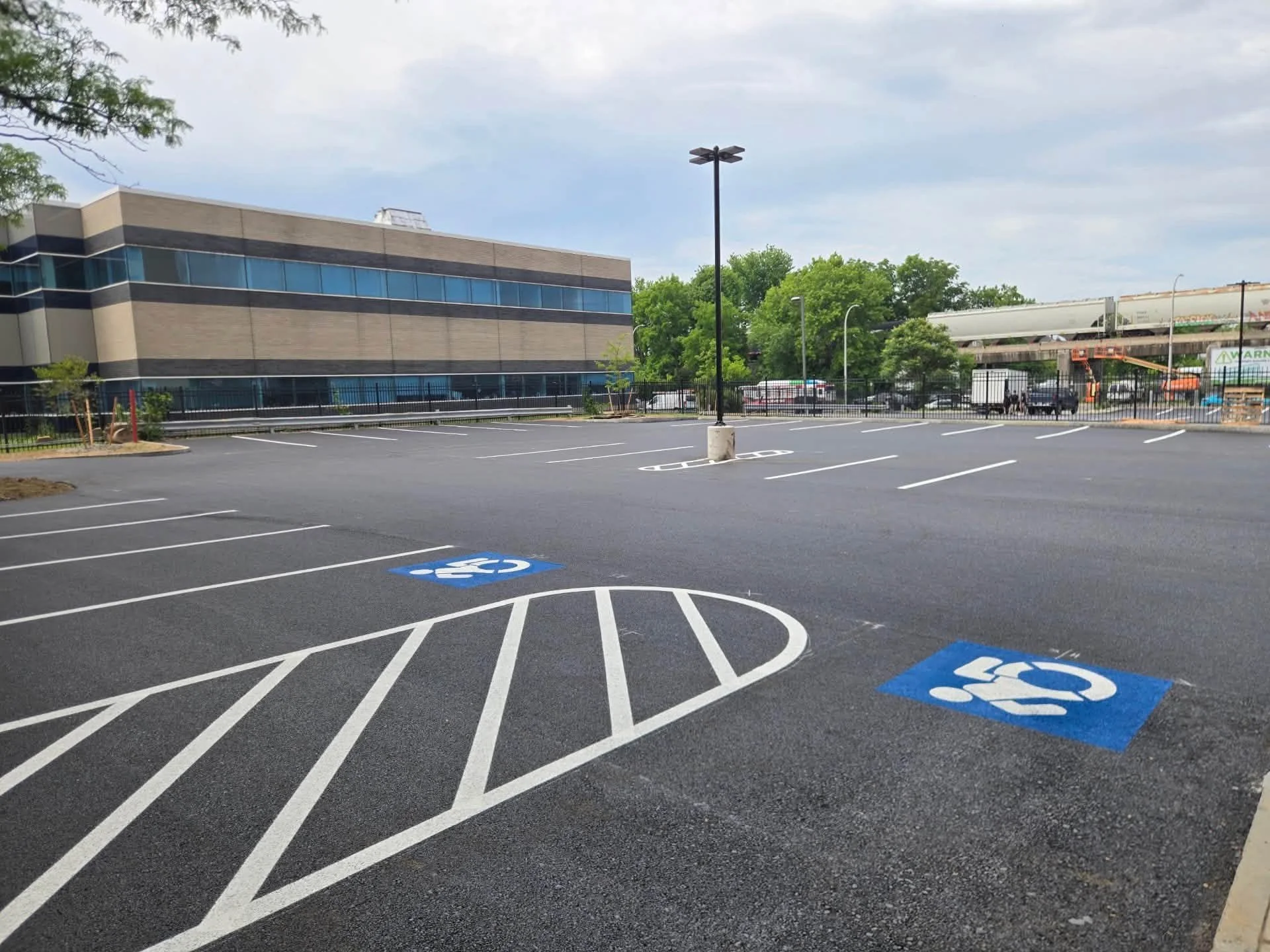 Newly paved and striped commercial parking lot