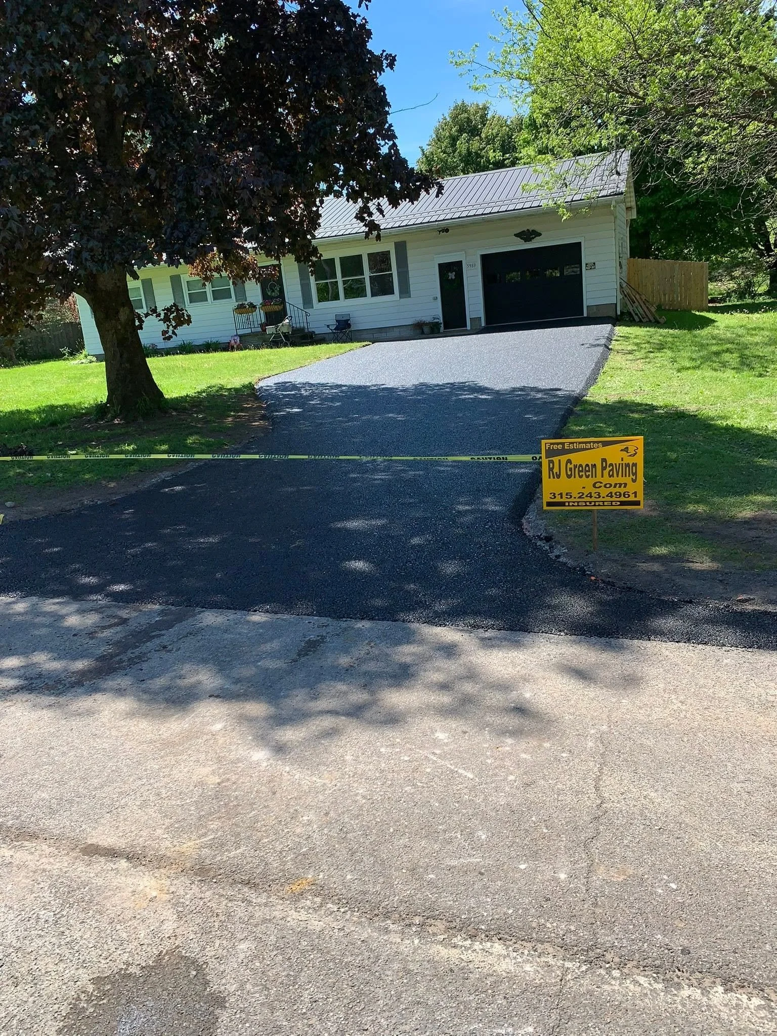 Newly paved driveway with clean edges