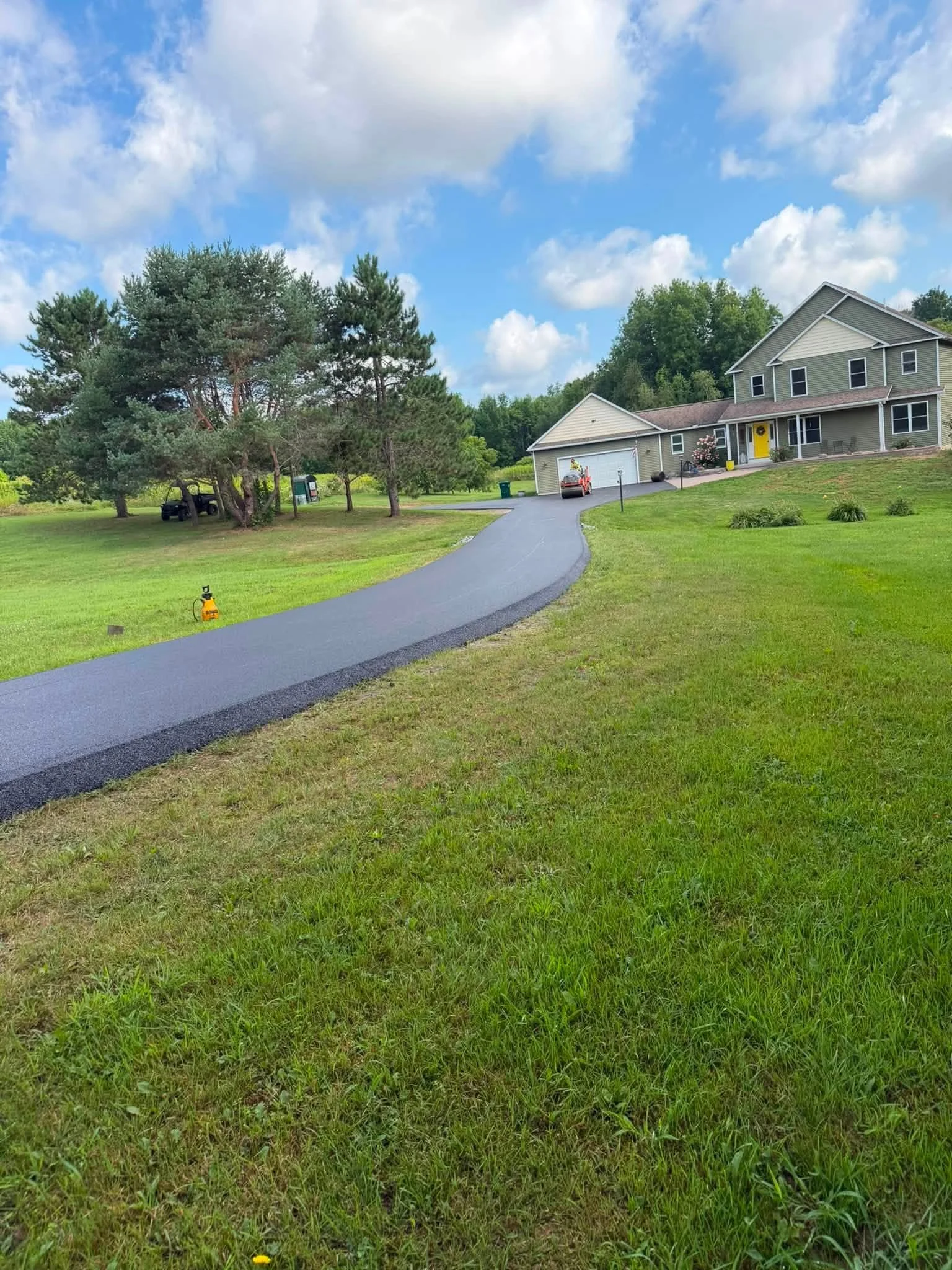 New asphalt driveway paved by RJ Green