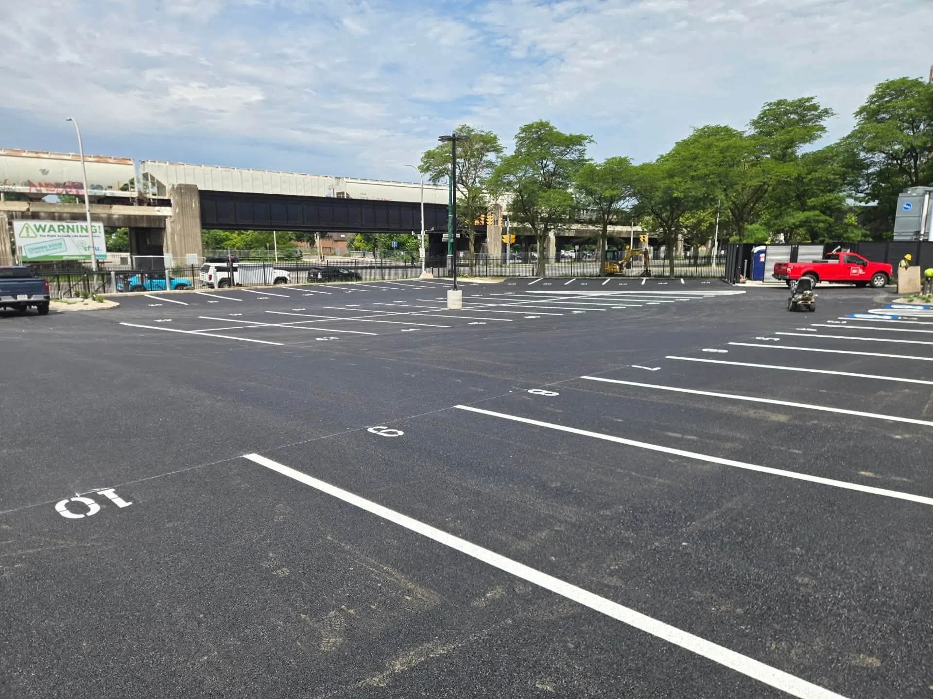 Freshly paved and striped city parking lot