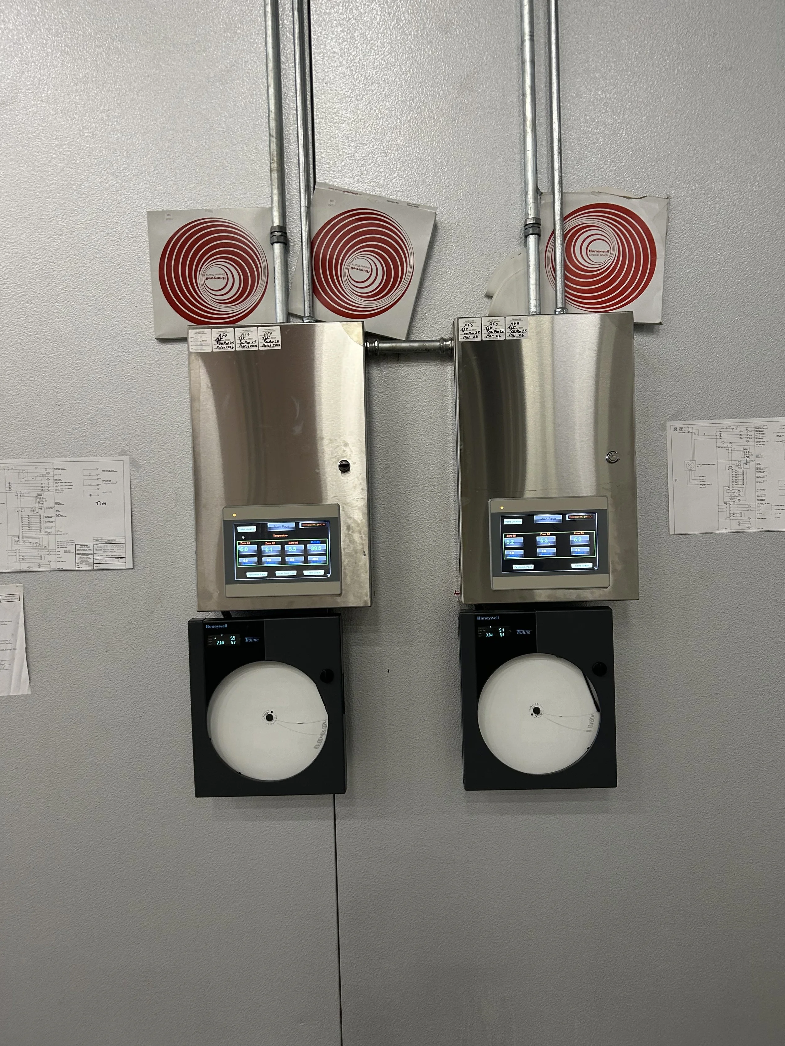 Control equipment installed beside an Air Flow Services chamber