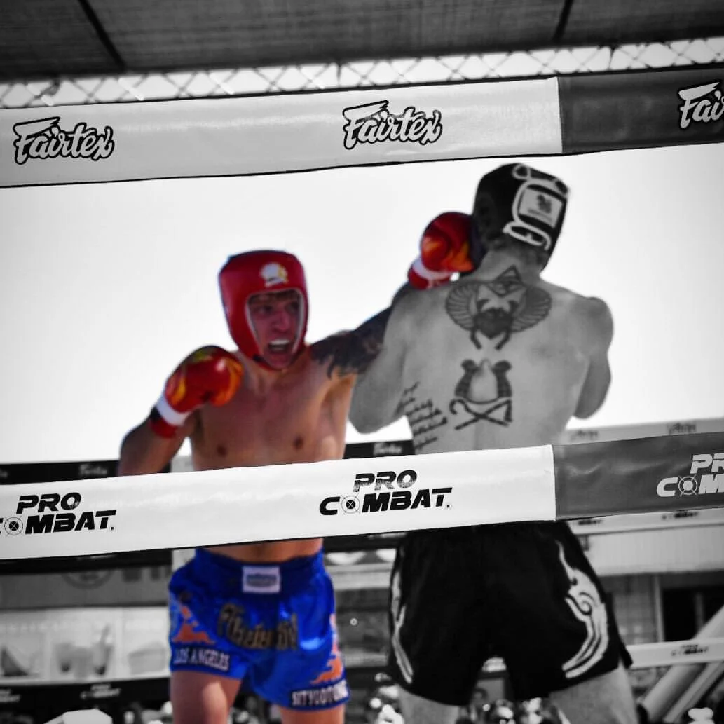 Daniel exchanging punches during a kickboxing bout