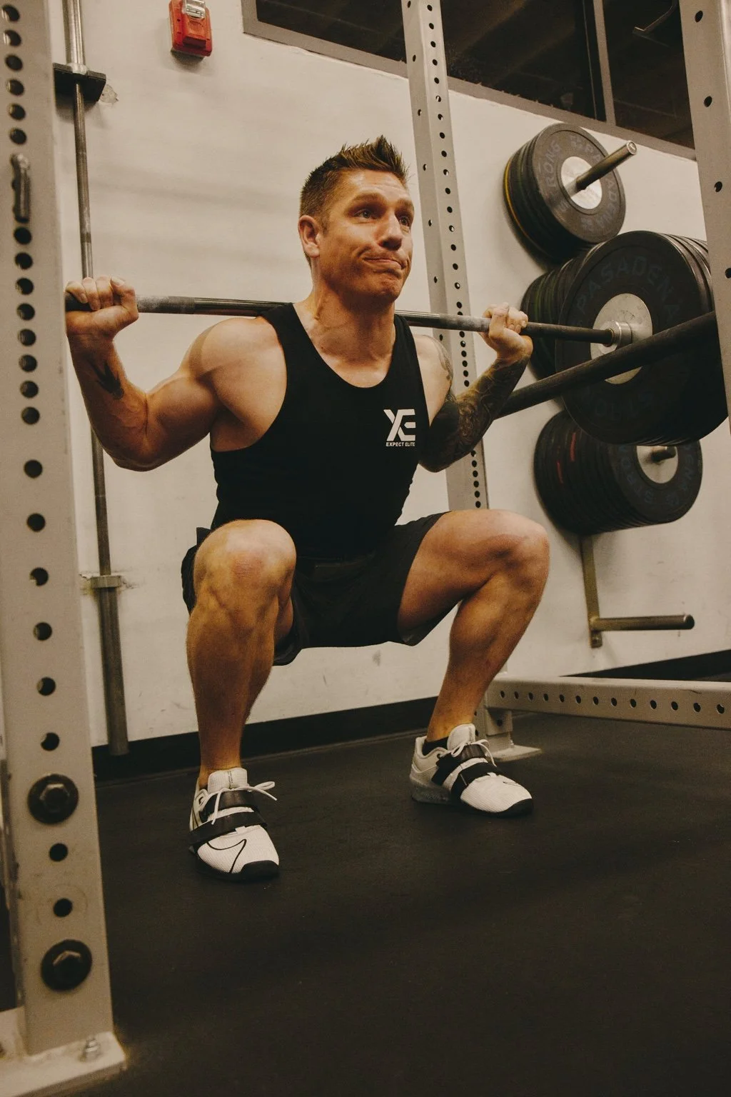 Daniel performing a back squat