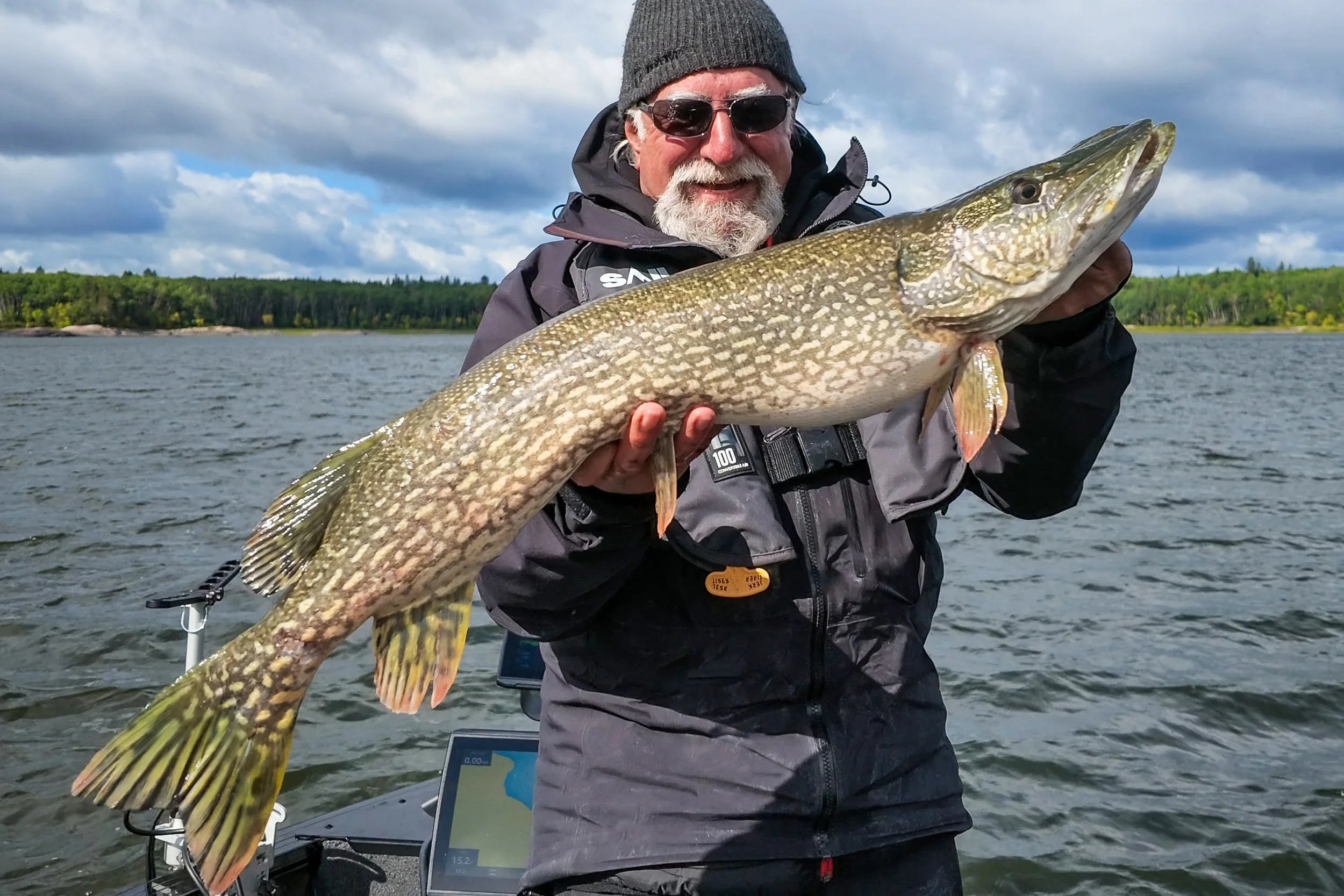 Angelo Viola with a northern pike on the lake