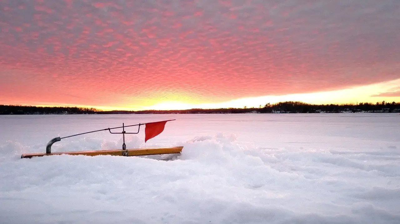A tip-up sitting on a frozen lake