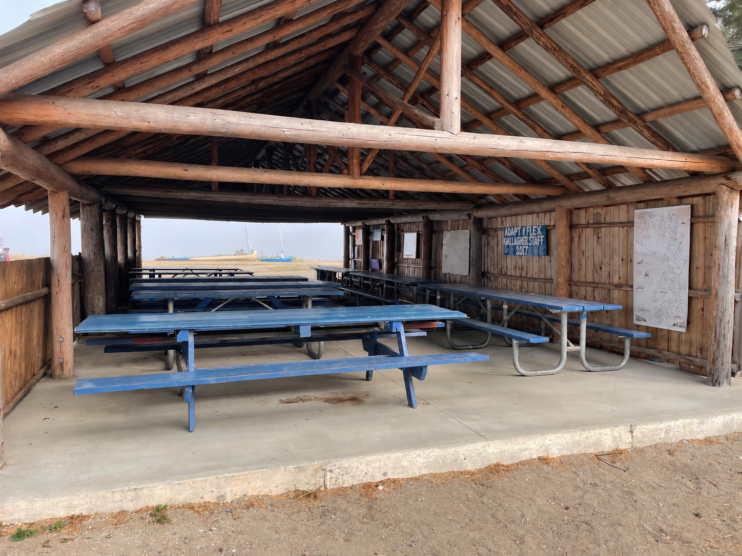 Sequim dining hall today, an open-sided shelter with blue picnic tables