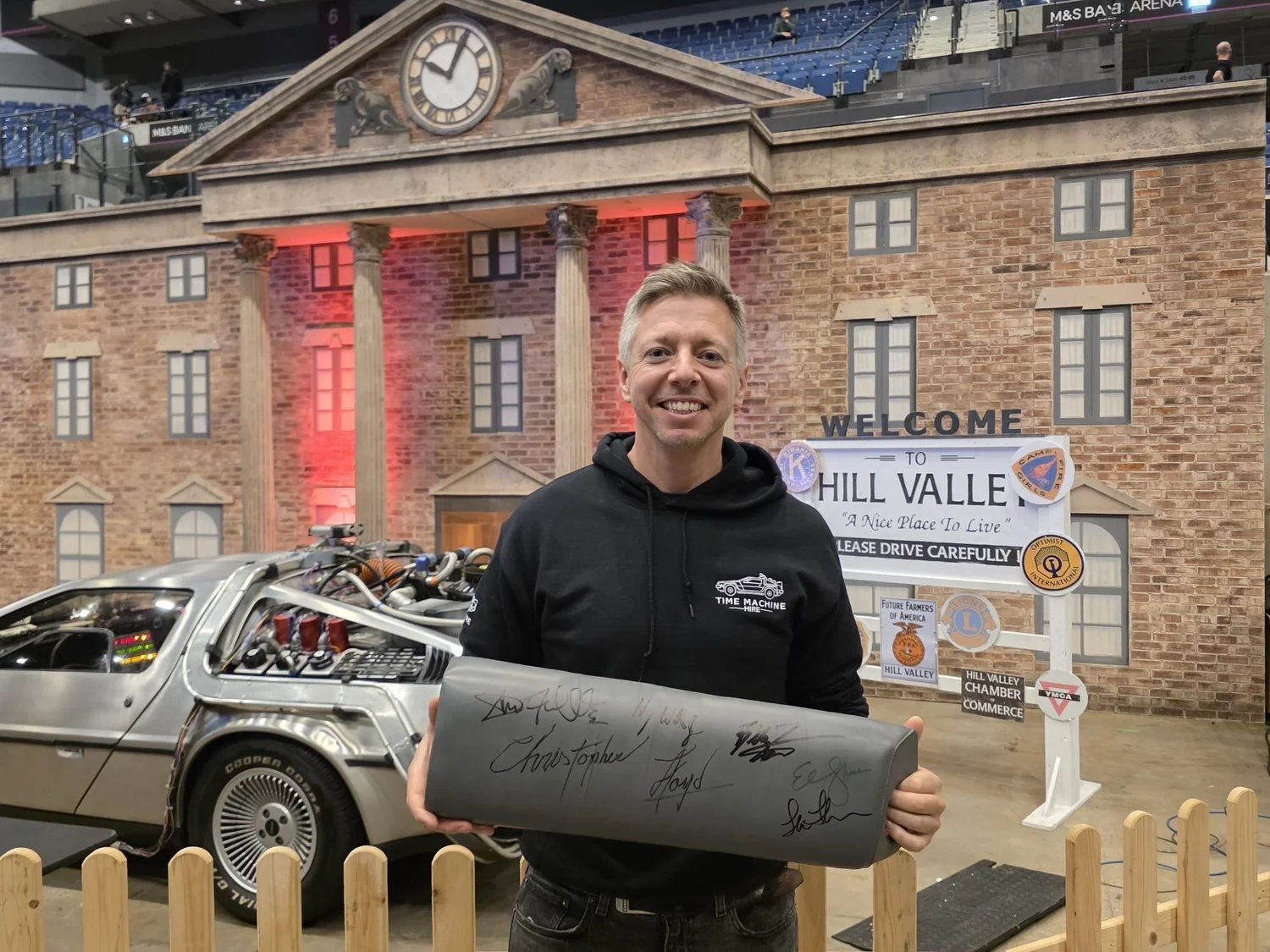 Nick with the signed knee pad at the Hill Valley courthouse set, Liverpool Comic Con 2026