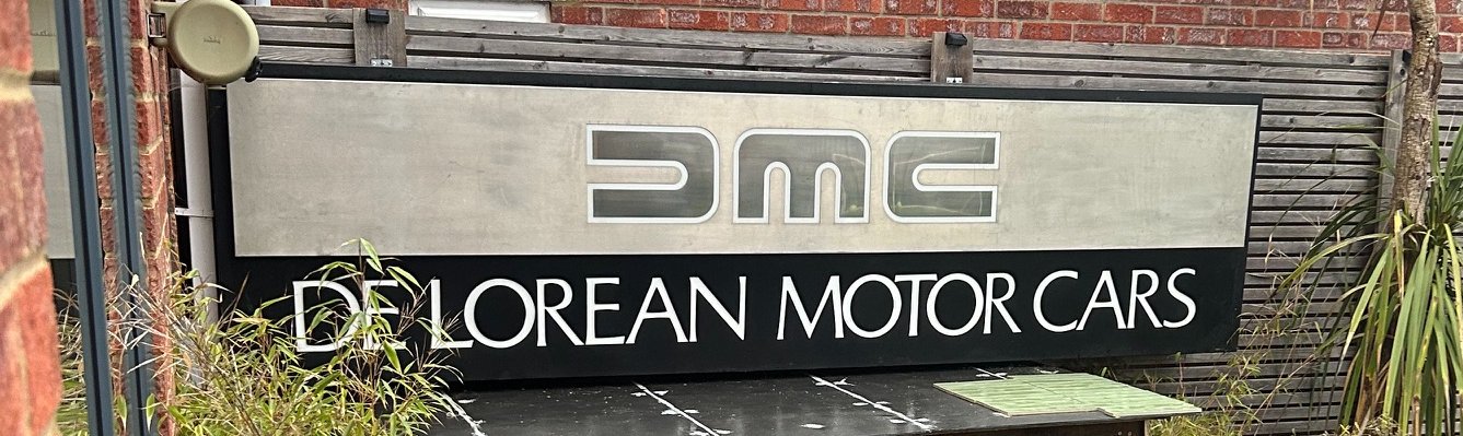 Original light-up DeLorean dealership sign