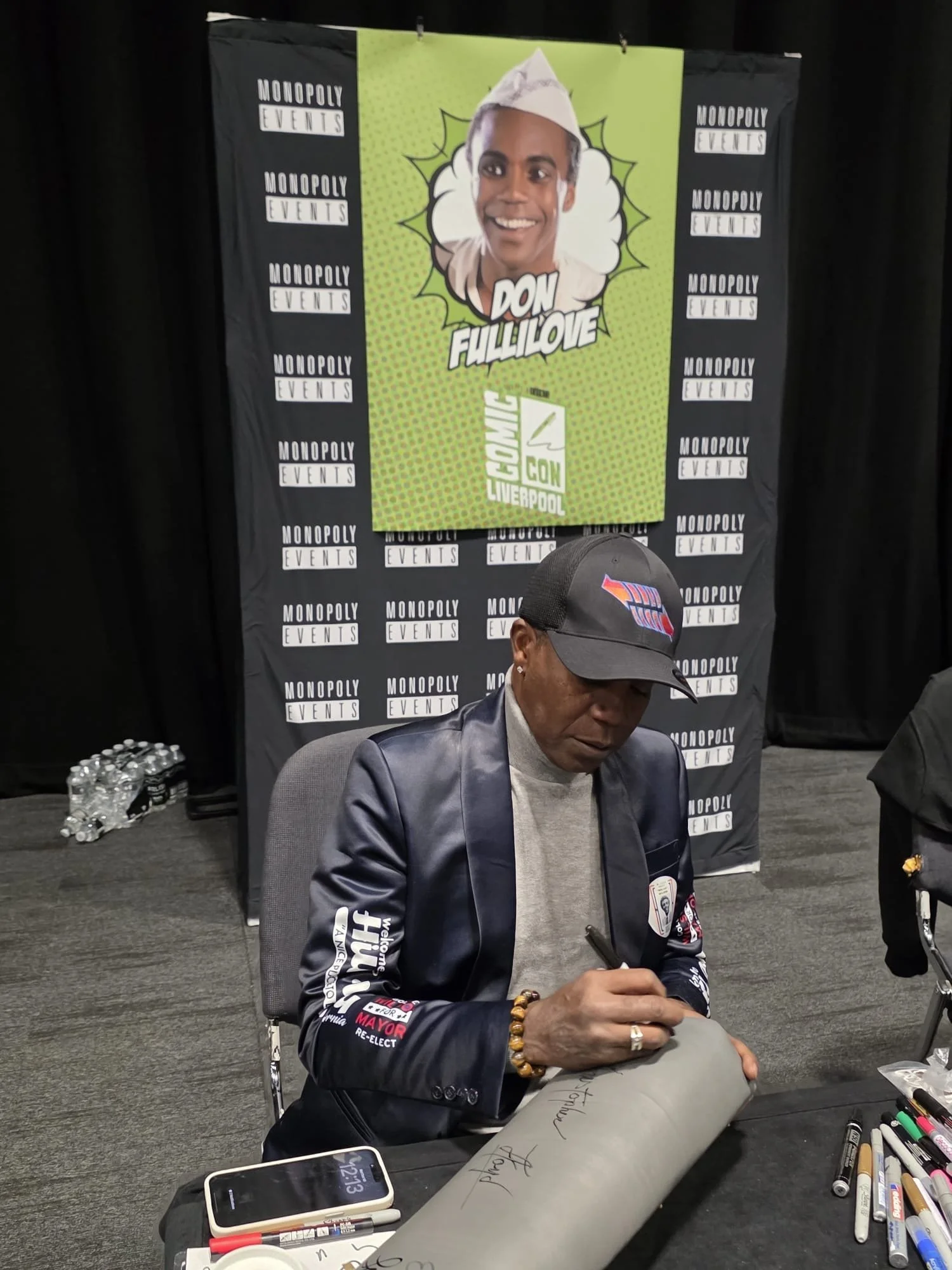 Don Fullilove signing the time machine knee pad