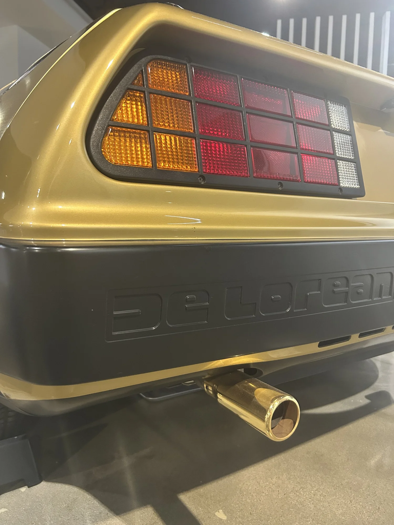 Rear lights of the gold DeLorean