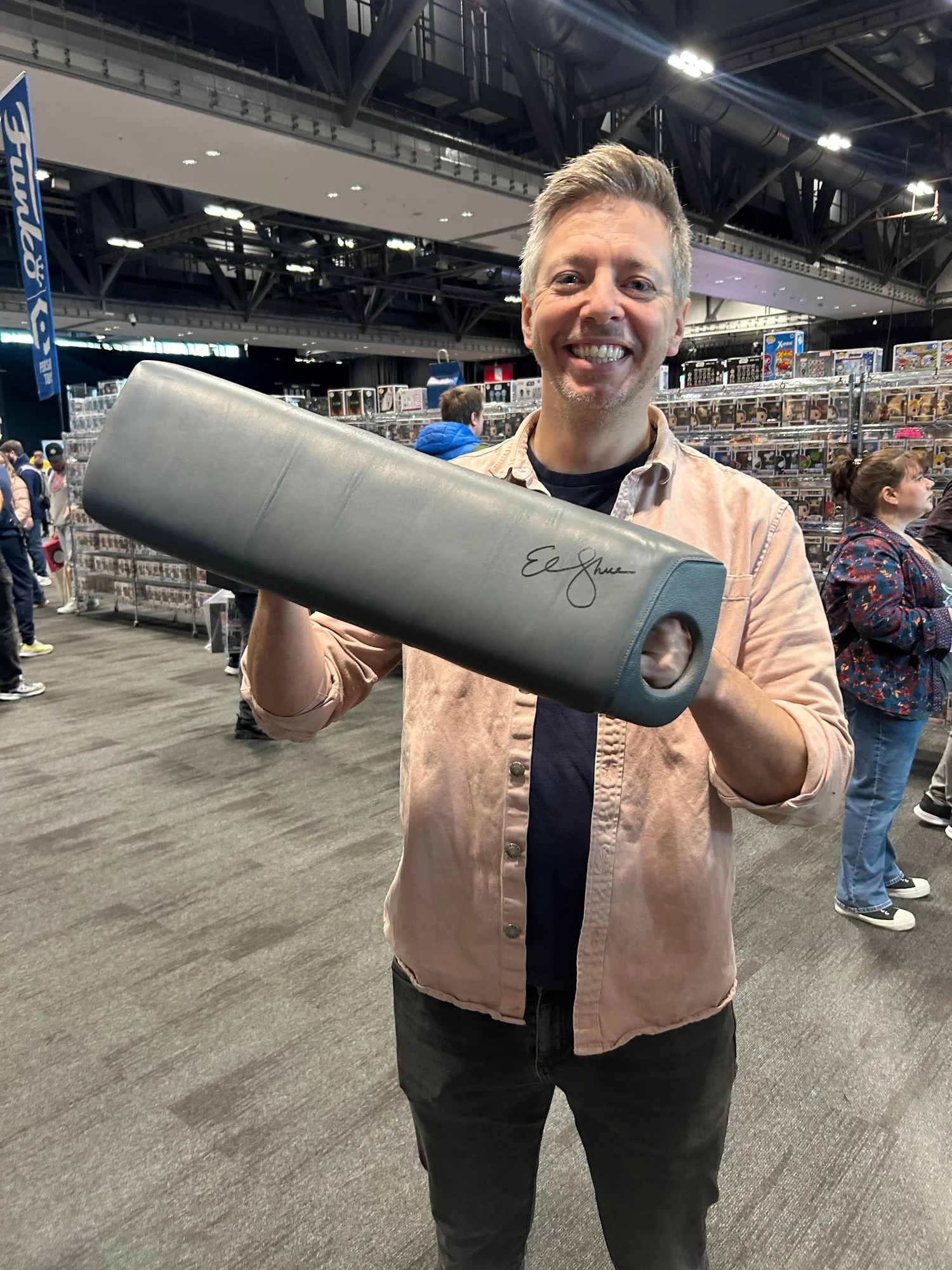Nick with the knee pad signed by Elizabeth Shue