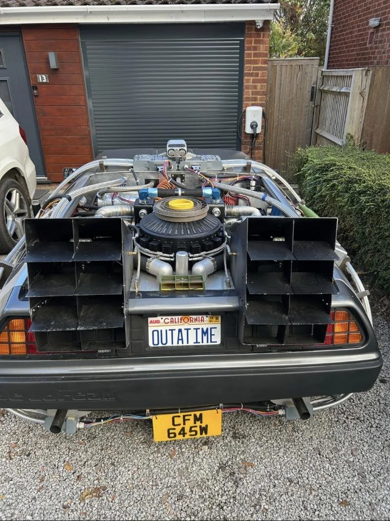 Close-up of the time machine's rear vents, reactor and OUTATIME number plate