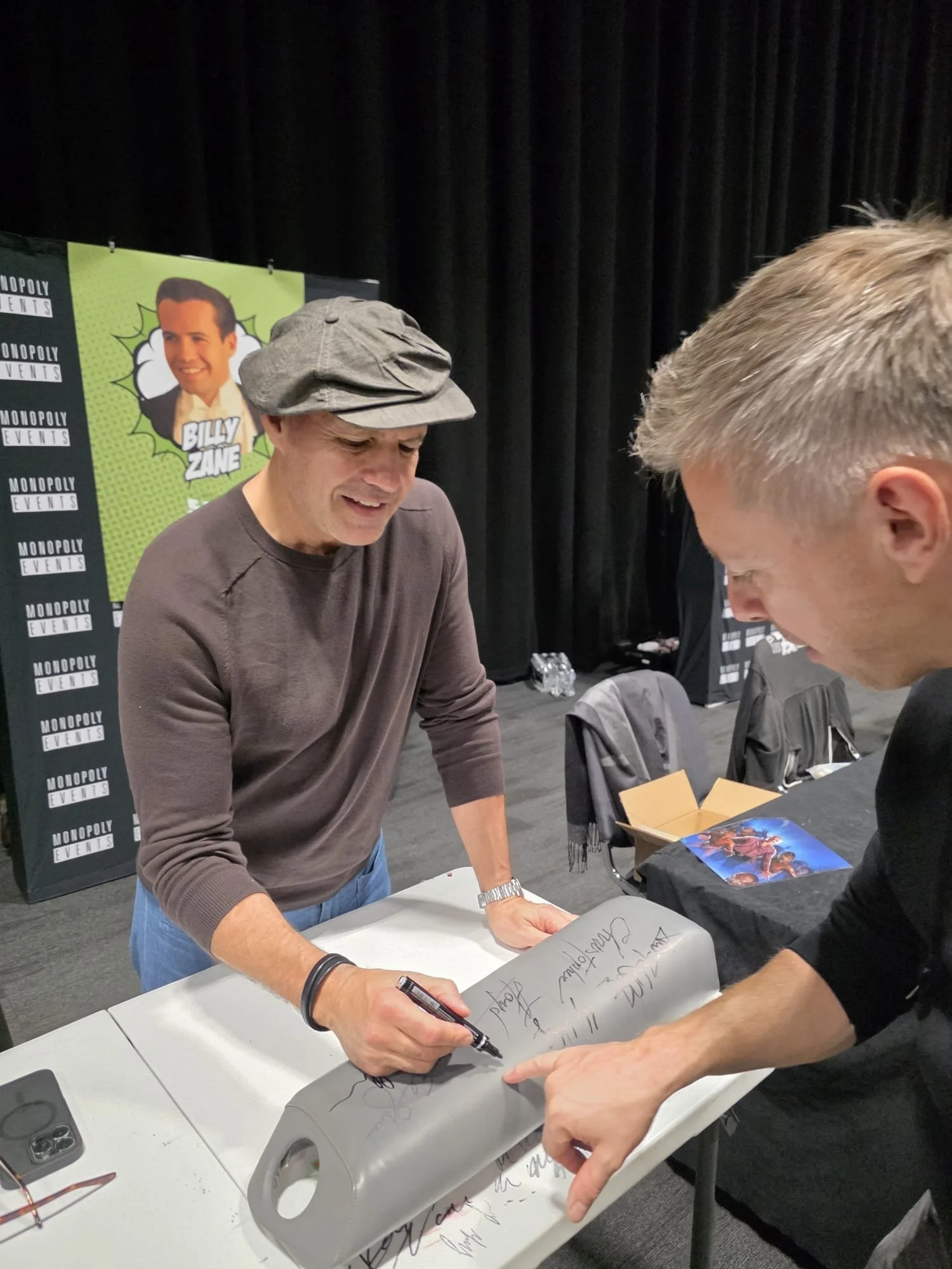 Billy Zane signing the time machine knee pad