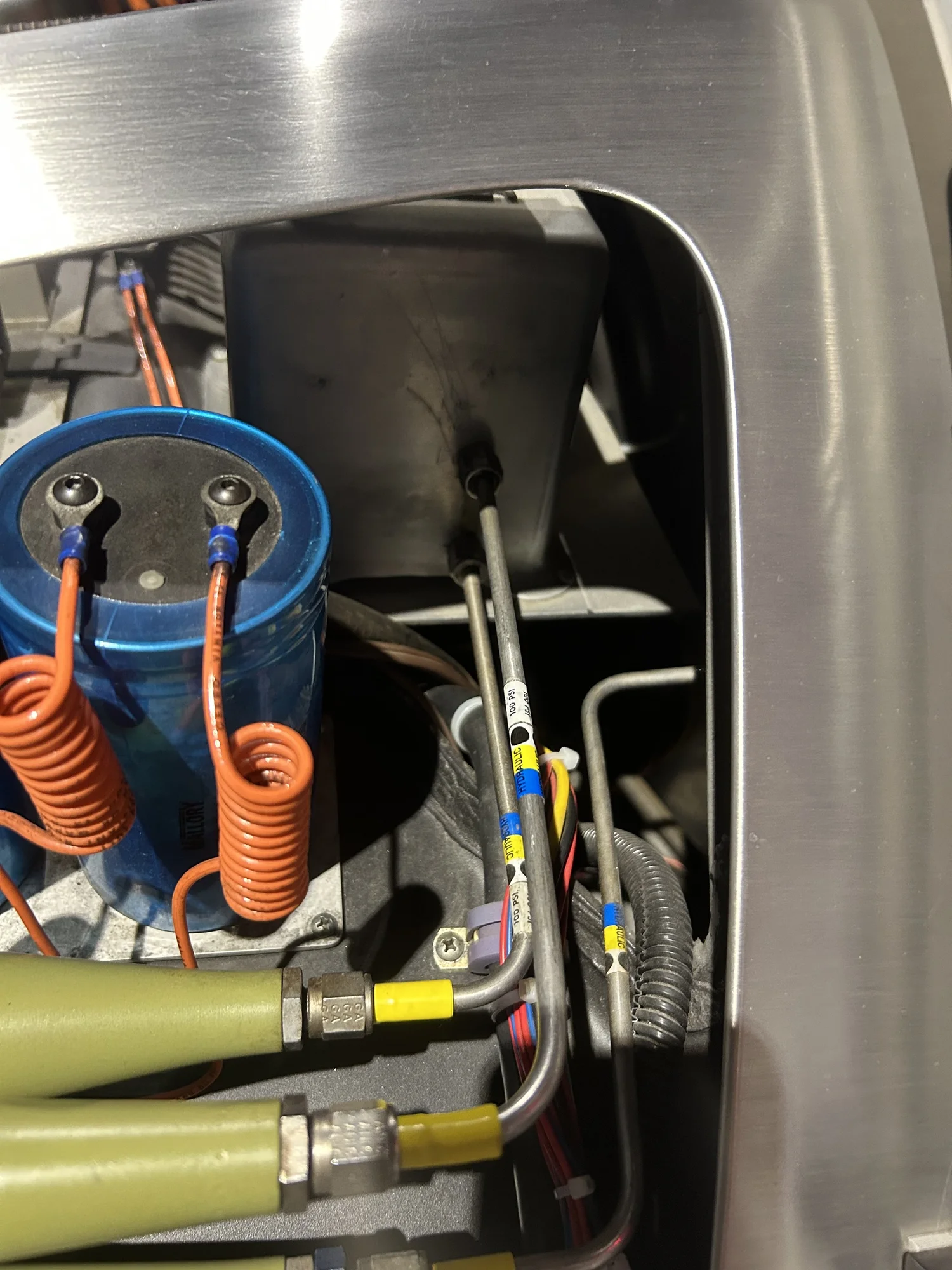 Capacitor and coils inside the A car rear quarter